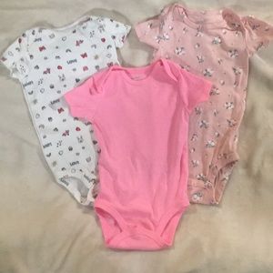 3 Carter’s bodysuits